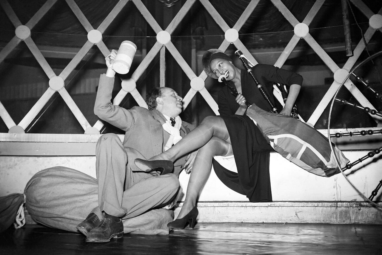(FILES) In this file photo taken on February 13, 1949 Josephine Baker poses with Michel Gyarmathy, artistic director, director and costume designer at the Folies Berg�re in Paris, to celebrate her return on the stage of the famous Parisian cabaret, where she will be the star of the new revue created by Gyarmathy. - Josephine Baker will enter the Pantheon on November 30, 2021. (Photo by - / AFP)