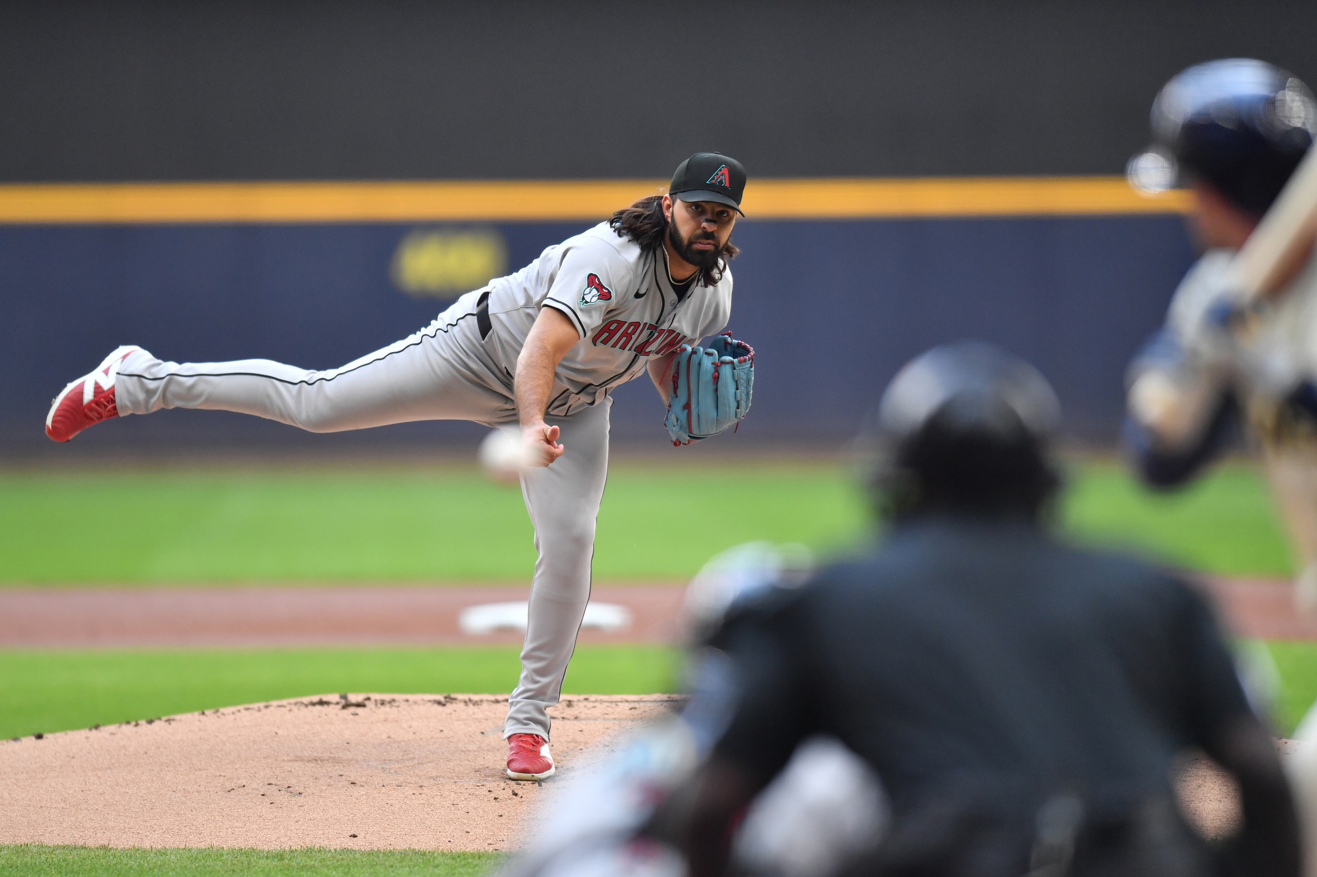 MILWAUKEE, WI - AUGUST 28: Nabil Crismatt #61 of the Arizona Diamondbacks pitches during the first inning of an MLB game against the Milwaukee Brewers on August 28, 2025, at American Family Field in Milwaukee, WI. (Photo by Patrick Gorski/Icon Sportswire via Getty Images)