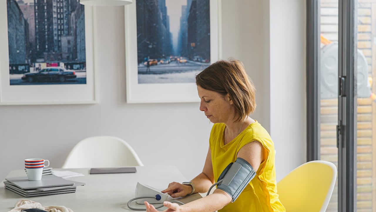 Woman checking blood pressure