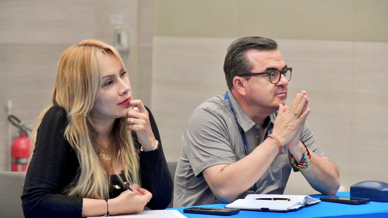 SANDRA ORTIZ Y OLMEDO LÓPEZ