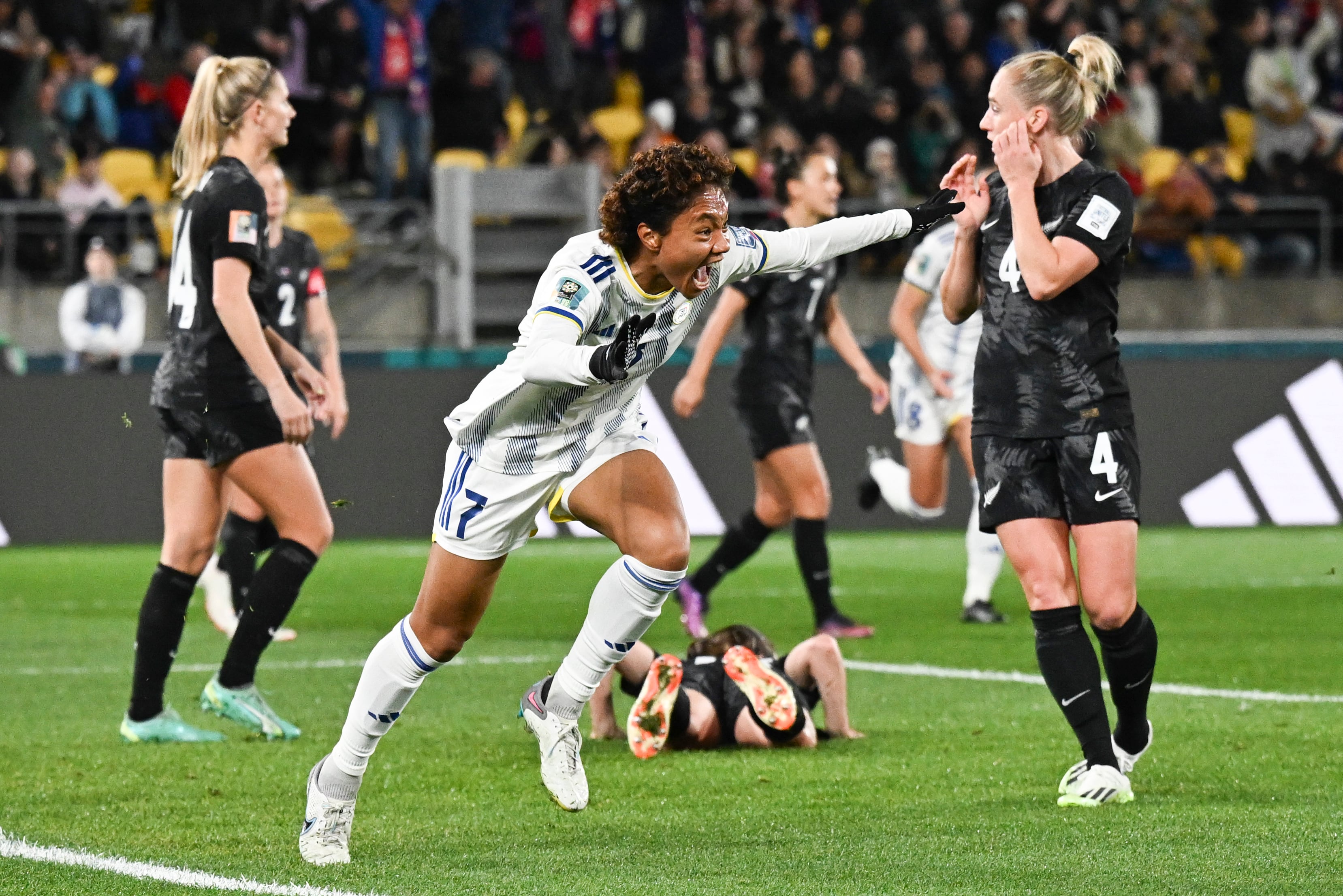 Philippines' Sarina Bolden reacts after scoring her team's first goal during the Women's World Cup Group A soccer match between New Zealand and the Philippines in Wellington, New Zealand, Tuesday, July 25, 2023. (AP Photo/Andrew Cornaga)