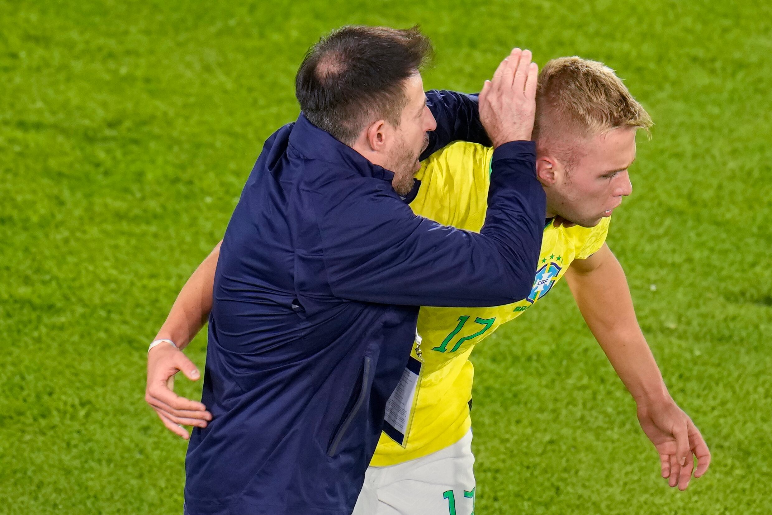 Brazil's coach Ramon Menezes, left, congratulates his player Ronald after he scored his side's second goal against Paraguay during a South America U-20 Championship soccer match in Bogota, Colombia, Monday, Feb. 6, 2023. (AP Photo/Fernando Vergara)