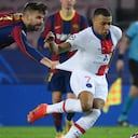 Gerard Pique y Kylian Mbappé. Foto: AFP/LLUIS GENE