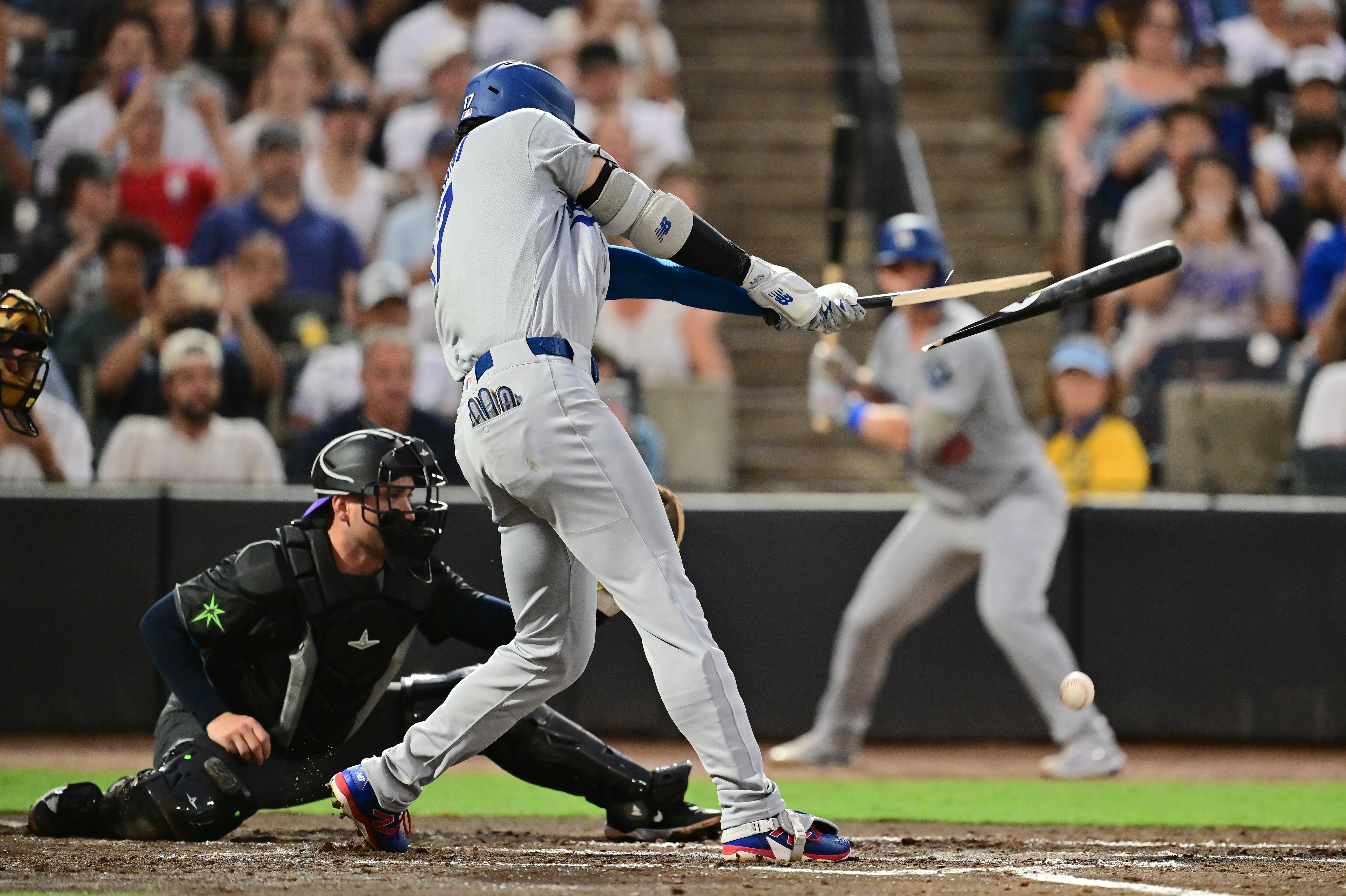 TAMPA, FLORIDA - AUGUST 01: Shohei Ohtani #17 of the Los Angeles Dodgers breaks his bat while hitting a single in the third inning against the Tampa Bay Rays at George M. Steinbrenner Field on August 01, 2025 in Tampa, Florida. (Photo by Julio Aguilar/Getty Images)