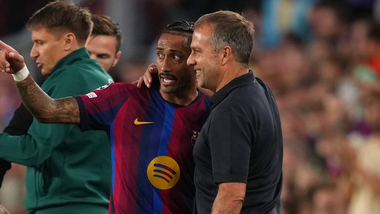 Hansi Flick y Raphinha, juntos, en FC Barcelona.