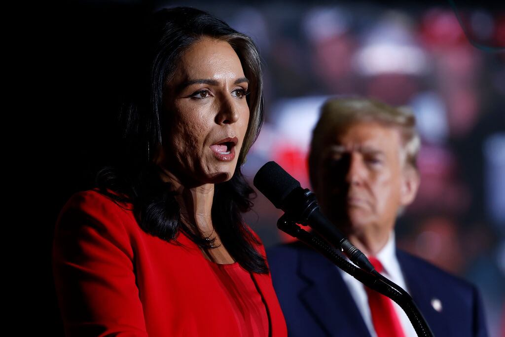 GREENSBORO, NORTH CAROLINA - OCTOBER 22: Former U.S. Representative from Hawaii Tulsi Gabbard speaks as Republican party as Republican presidential nominee, former U.S. President Donald Trump listens at a campaign rally at the Greensboro Coliseum on October 22, 2024 in Greensboro, North Carolina. With 14 days to go until Election Day, Trump continues to crisscross the country campaigning to return to office. (Photo by Anna Moneymaker/Getty Images)