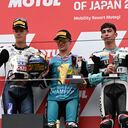 CFMOTO Aspar Team rider David Alonso of Colombia celebrates his victory and the 2024 World Champion on the podium after winning the Moto3 class race of the MotoGP Japanese Grand Prix at the Mobility Resort Motegi in Motegi, Tochigi prefecture on October 6, 2024. (Photo by Toshifumi KITAMURA / AFP)