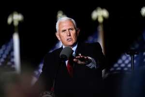 FILE - In this Oct. 28, 2020, file photo Vice President Mike Pence speaks at a campaign event in Flint, Mich. A group of Democratic lawmakers on Monday, Nov. 2, called on the Trump administration to stop the expulsion of unaccompanied children and other asylum seekers at the U.S. border using emergency powers granted during the coronavirus pandemic. (AP Photo/Paul Sancya, File)