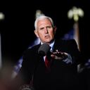 FILE - In this Oct. 28, 2020, file photo Vice President Mike Pence speaks at a campaign event in Flint, Mich. A group of Democratic lawmakers on Monday, Nov. 2, called on the Trump administration to stop the expulsion of unaccompanied children and other asylum seekers at the U.S. border using emergency powers granted during the coronavirus pandemic. (AP Photo/Paul Sancya, File)