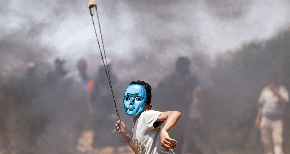 Las protestas en oriente medio están lejos de terminar, más con un nuevo caso de un niño asesinado por el ejército israelí. - Foto: Jaafar Ashtiyeh / AFP