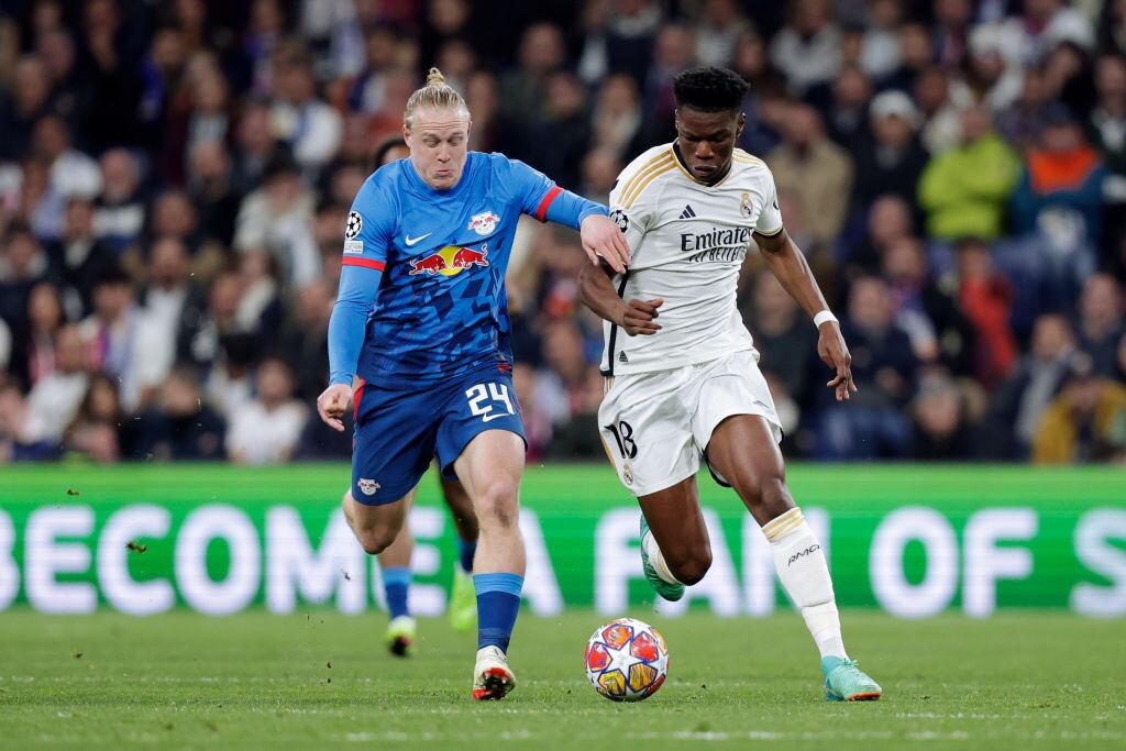 MADRID, SPAIN - MARCH 6: (L-R) Xaver Schlager of RB Leipzig, Aurelien Tchouameni of Real Madrid  during the UEFA Champions League  match between Real Madrid v RB Leipzig at the Estadio Santiago Bernabeu on March 6, 2024 in Madrid Spain (Photo by David S. Bustamante/Soccrates/Getty Images)