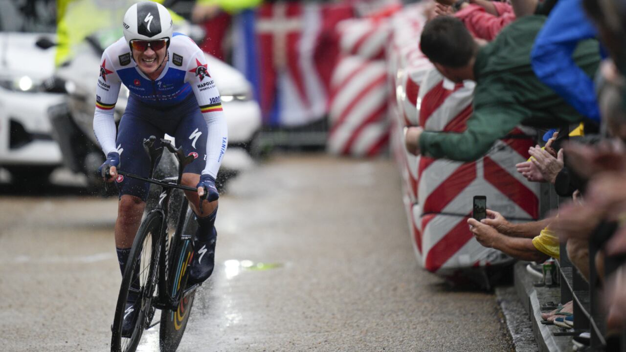 Belgium's Yves Lampaert rides during the first stage of the Tour de France cycling race, an individual time trial over 13.2 kilometers (8.2 miles) with start and finish in Copenhagen, Denmark, Friday, July 1, 2022. (AP Photo/Daniel Cole)