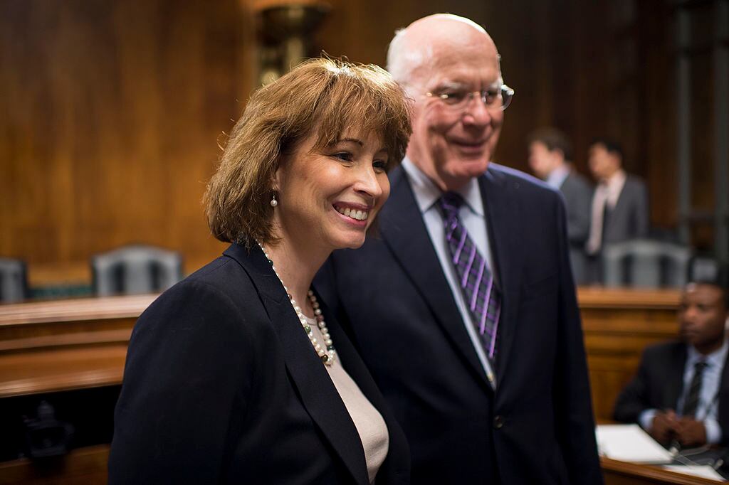 UNITED STATES - JULY 10: Patricia Ann Millett, nominee to be U.S. circuit judge for the District of Columbia Circuit, speaks with chairman Patrick Leahy, D-Vt., before the Senate Judiciary Committee hearing on the nominations of four judges on Wednesday, July 10, 2013. (Photo By Bill Clark/CQ Roll Call)