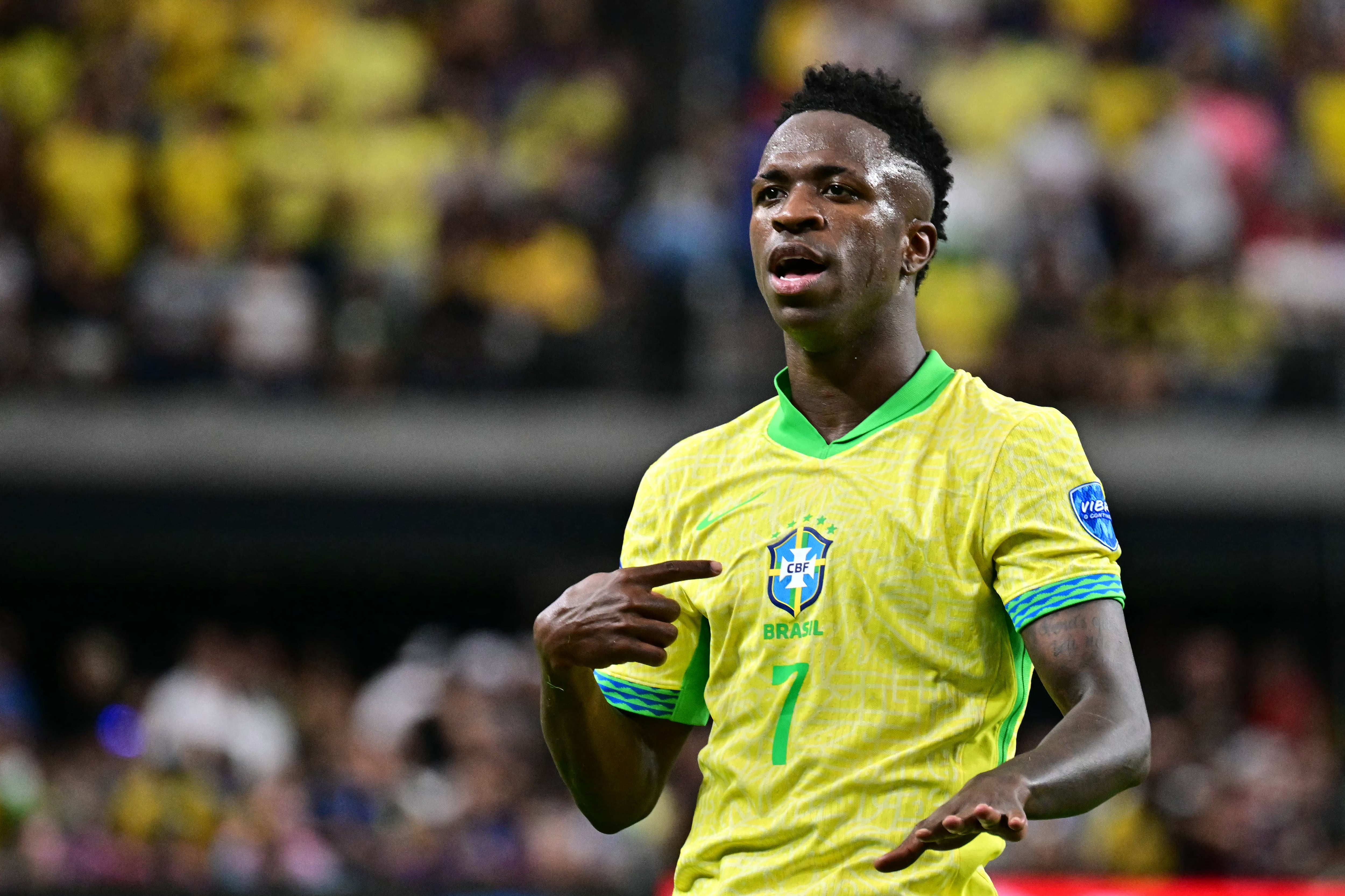 Brazil's forward #07 Vinicius Junior celebrates scoring his team's third goal during the Conmebol 2024 Copa America tournament group D football match between Paraguay and Brazil at Allegiant Stadium in Las Vegas, Nevada on June 28, 2024. (Photo by Frederic J. Brown / AFP)