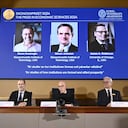 Academy of Sciences permanent secretary Hans Ellegren (C), Jakob Svensson (L) and Jan Teorell of the Nobel Assembly sit in front of a screen displaying the laureates (L-R) Turkish-American Daron Acemoglu and British-Americans Simon Johnson and James Robinson of the 2024 Sveriges Riksbank Prize in Economic Sciences in Memory of Alfred Nobel during the announcement by the Royal Swedish Academy of Sciences in Stockholm, Sweden on October 14, 2024. (Photo by Christine Olsson/TT / TT NEWS AGENCY / AFP) / Sweden OUT