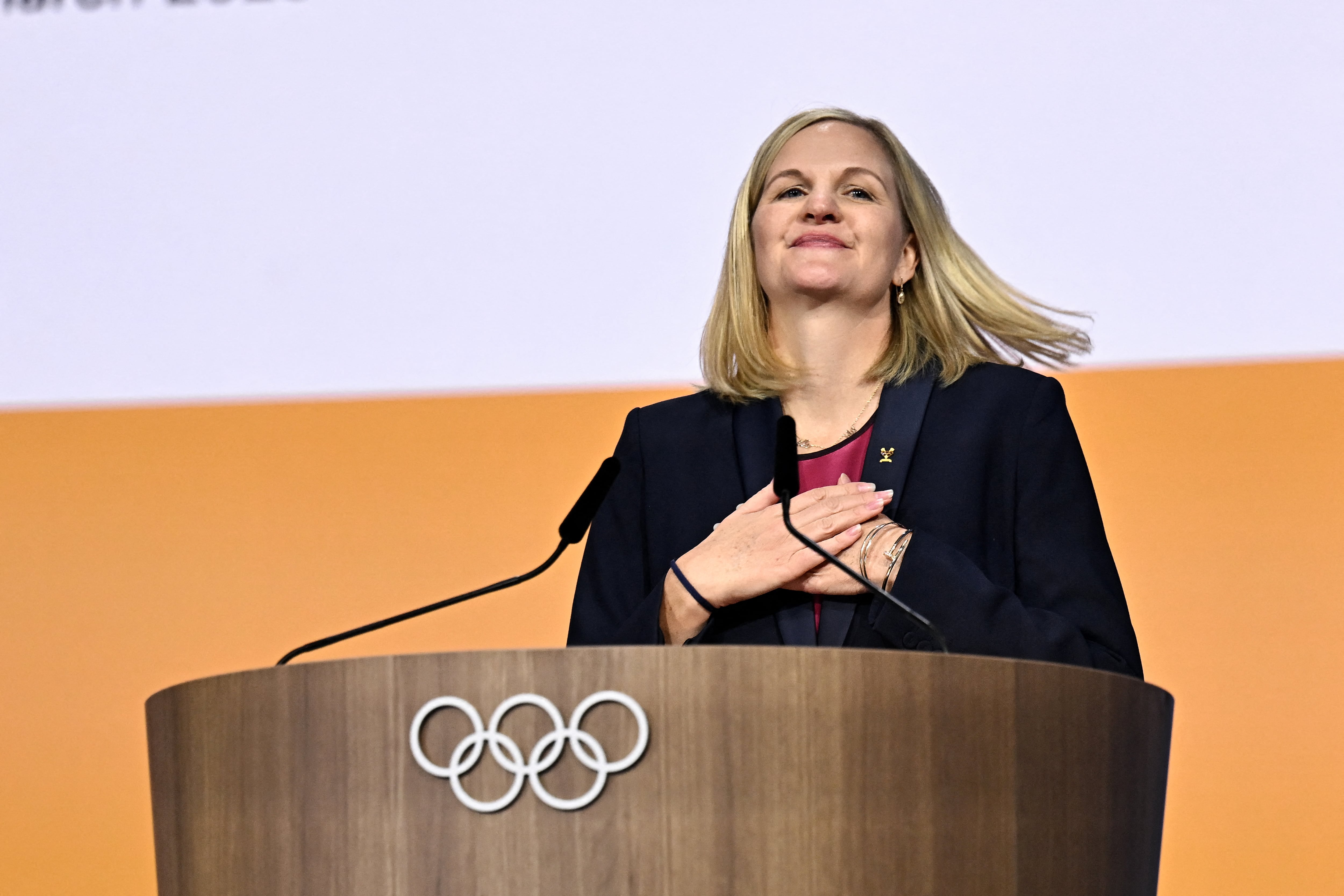 Zimbabwean candidate for the presidency of the International Olympic Committee (IOC) Kirsty Coventry reacts after being elected during the 144th IOC Session on the day of the election of the next President of the International Olympic Committee (IOC), in Costa Navarino, Greece on March 20, 2025. Zimbabwe's Kirsty Coventry was elected president of International Olympic Committee on March 20, 2025. (Photo by Fabrice COFFRINI / AFP)