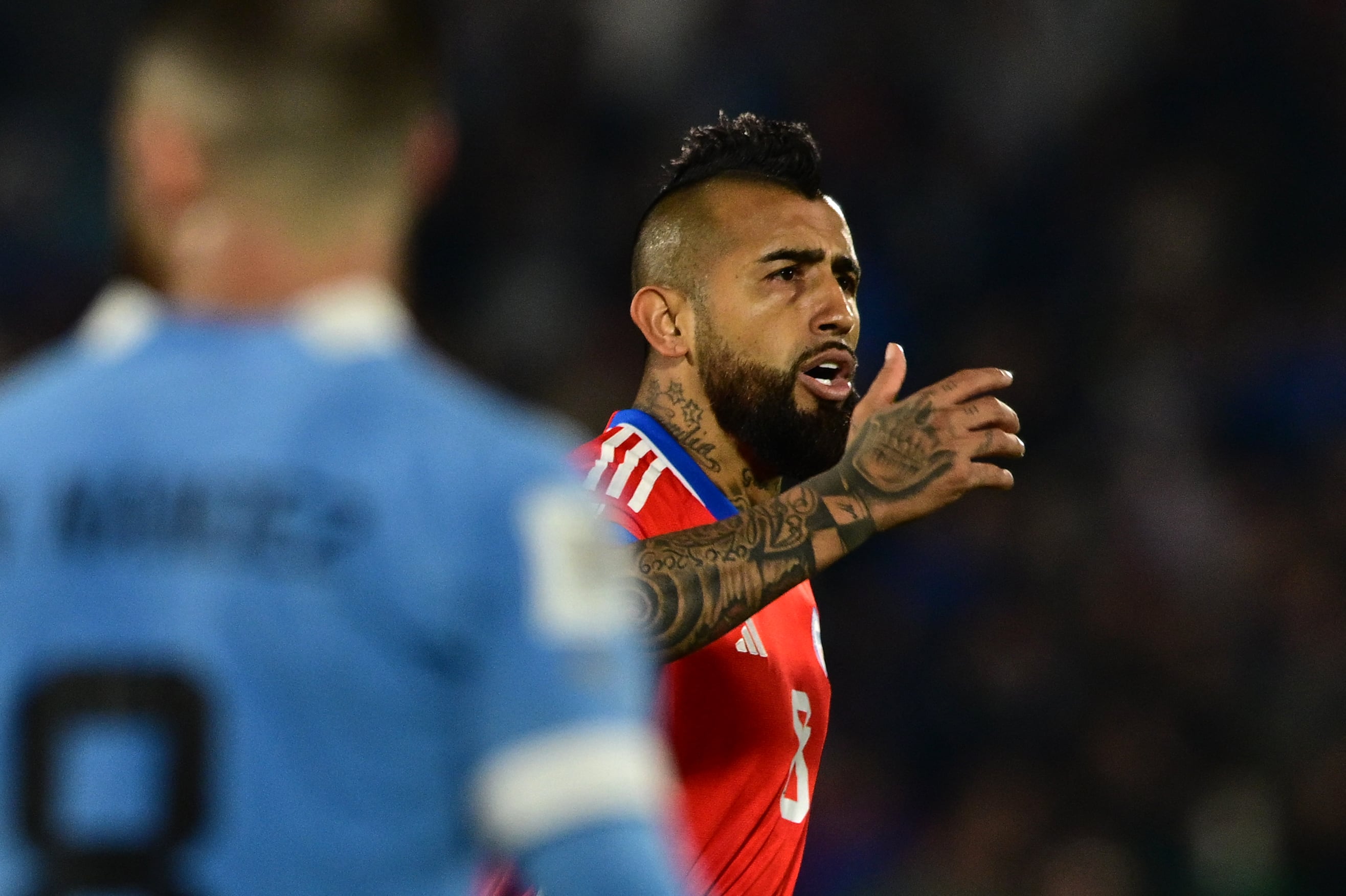 Chile's midfielder Arturo Vidal celebrates after scoring a goal during the 2026 FIFA World Cup South American qualifiers football match between Uruguay and Chile, at the Centenario stadium in Montevideo, on September 8, 2023. (Photo by Pablo PORCIUNCULA / AFP)