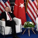 US President Joe Biden (R) gestures as Turkey's President Recep Tayyip Erdogan listens during a bilateral meeting on the sidelines of the NATO summit at the Ifema congress centre in Madrid, on June 29, 2022. (Photo by Brendan SMIALOWSKI / AFP)