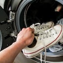 Putting sneakers into the washing machine