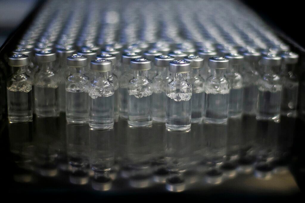 FILE - In this file photo dated Friday, Feb. 12, 2021, Doses of AstraZeneca vaccines for COVID-19 sit in vials at the Fiocruz Foundation after being bottled in Rio de Janeiro, Brazil. The World Health Organization Monday Feb. 15, 2021, granted an emergency authorization to the coronavirus vaccine made by AstraZeneca, a move that should allow its partners to ship millions of doses to countries worldwide as part of a U.N.-backed program to stop the pandemic.(AP Photo/Bruna Prado, FILE)