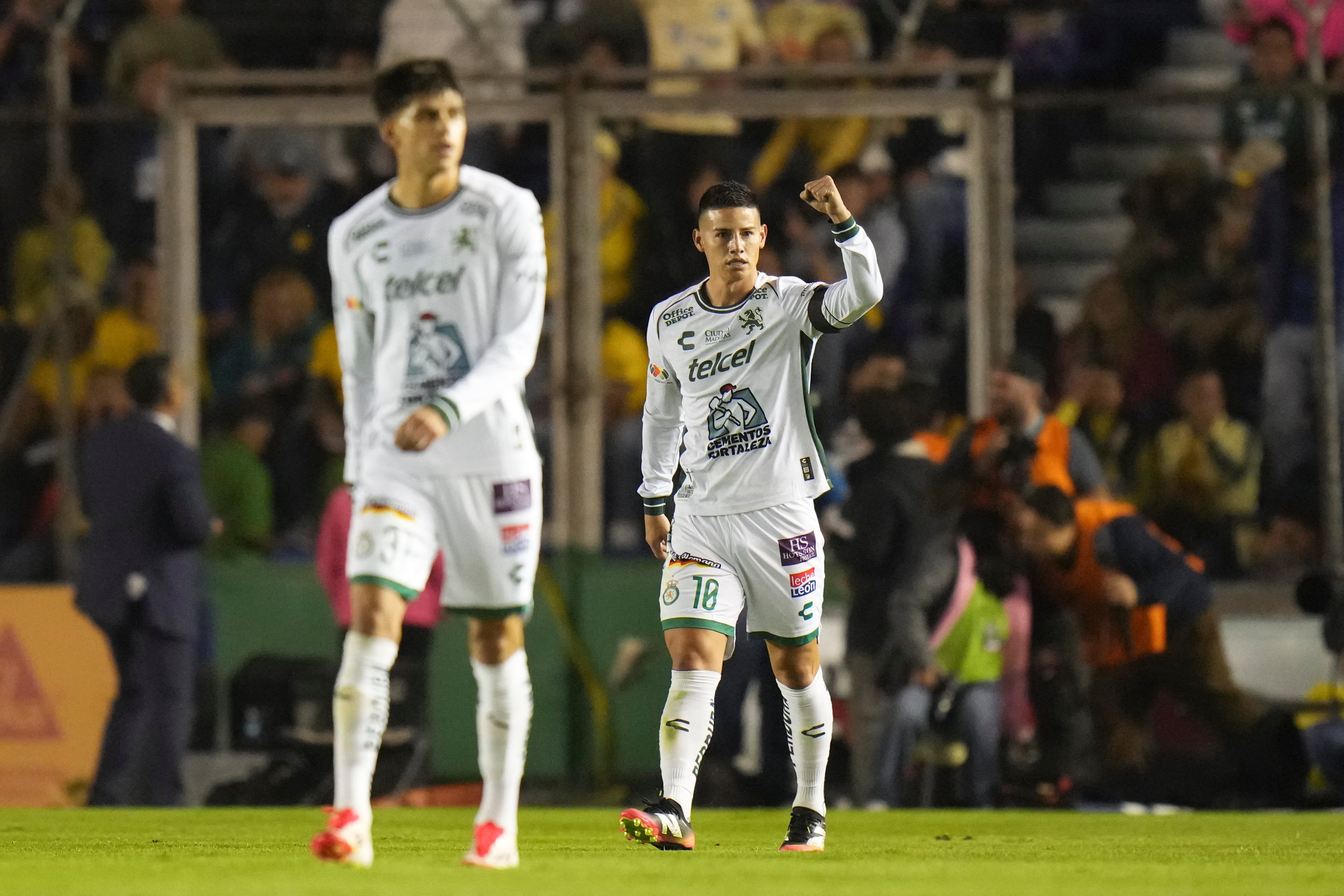 Leon's James Rodríguez celebrates after scoring his side's first goal against America during a Mexican soccer league match in Mexico City, Wednesday, Feb. 19, 2025. (AP Photo/Eduardo Verdugo)