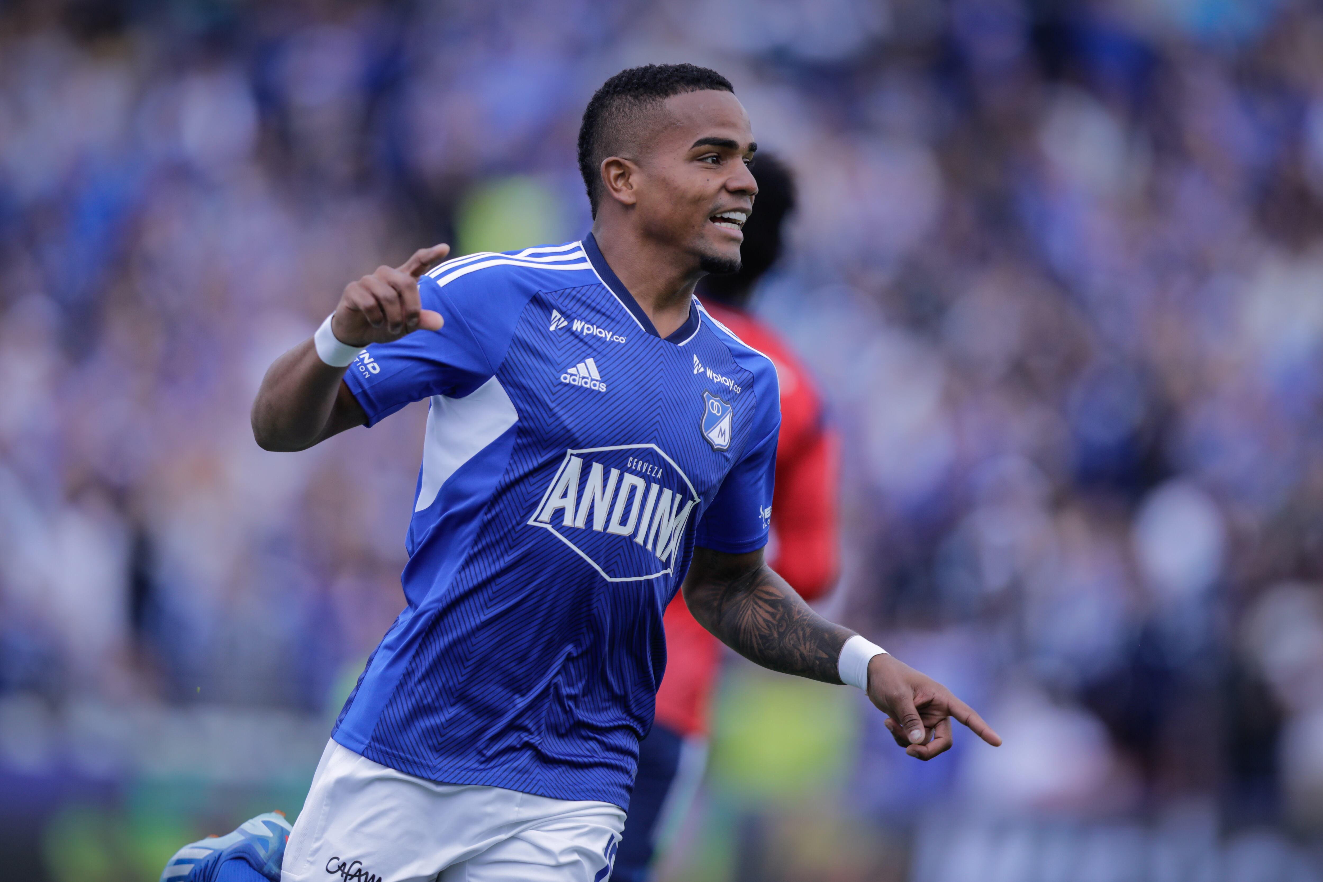BOGOTA, COLOMBIA - JANUARY 21: Edgar Guerra of Millonarios celebrates after scoring the first goal during the Liga BetPlay 1st round match between Millonarios and Independiente Medellin at Estadio El Campin on January 21, 2024 in Bogota, Colombia. (Photo by Andres Rot/Getty Images)