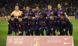 Soccer Football - LaLiga - FC Barcelona v Getafe - Camp Nou, Barcelona, Spain - January 22, 2023 FC Barcelona players pose for a team group photo before the match behind a banner in reference to the Chinese Lunar New Year REUTERS/Albert Gea