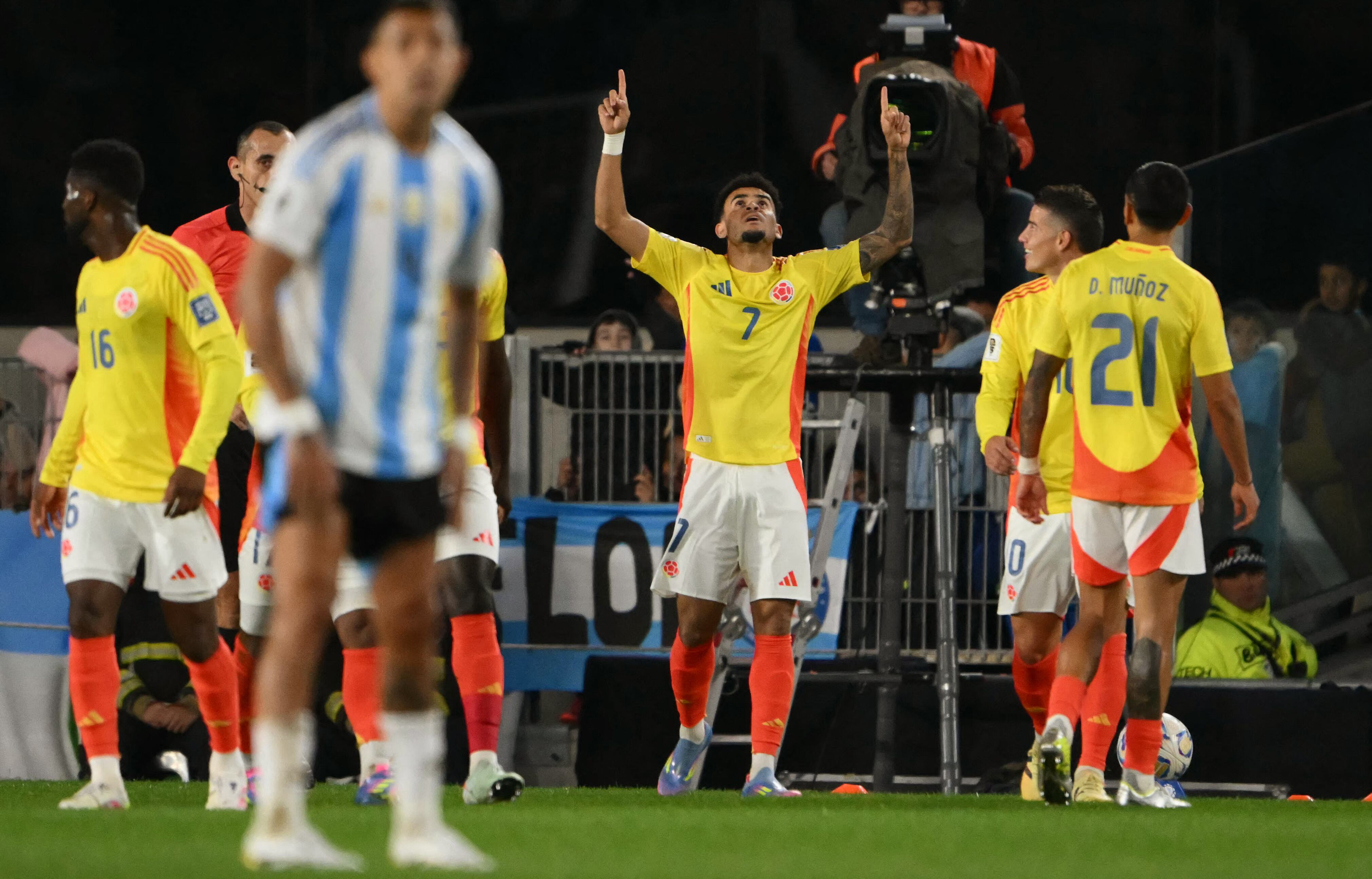 Colombia's forward #07 Luis Diaz celebrates scoring his team's first goal during the 2026 FIFA World Cup South American qualifiers football match between Argentina and Colombia at the Mas Monumental stadium in Buenos Aires, on June 10, 2025. (Photo by Luis ROBAYO / AFP)