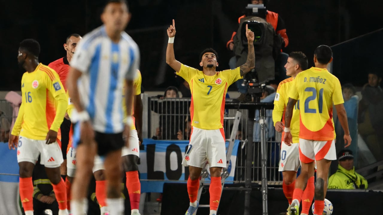 Colombia's forward #07 Luis Diaz celebrates scoring his team's first goal during the 2026 FIFA World Cup South American qualifiers football match between Argentina and Colombia at the Mas Monumental stadium in Buenos Aires, on June 10, 2025. (Photo by Luis ROBAYO / AFP)