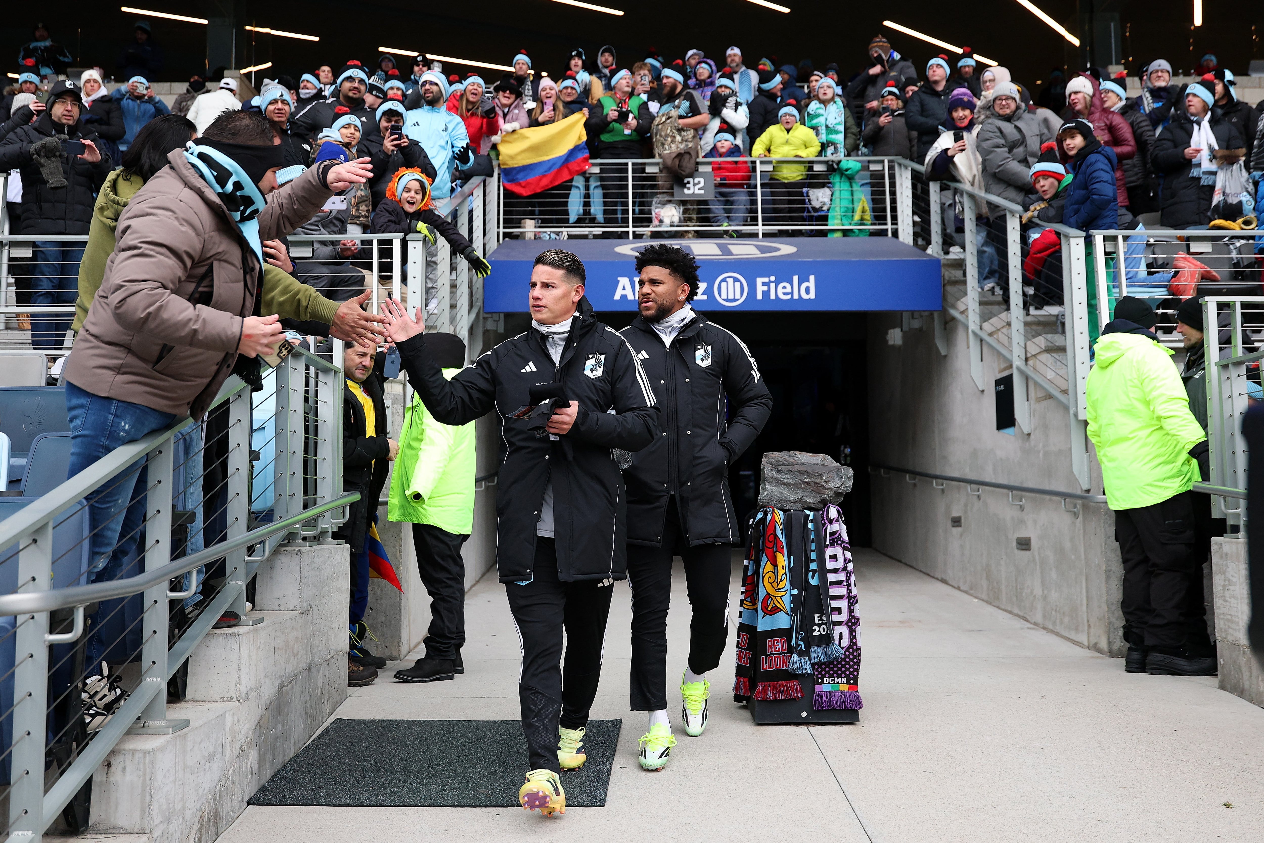 ST PAUL, MINNESOTA - FEBRUARY 28: James Rodr�guez #10 of Minnesota United greets fans as he walks onto the pitch with teammate Carlos Harvey #67 prior to the start of the match against FC Cincinnati at Allianz Field on February 28, 2026 in St Paul, Minnesota. David Berding/Getty Images/AFP (Photo by David Berding / GETTY IMAGES NORTH AMERICA / Getty Images via AFP)