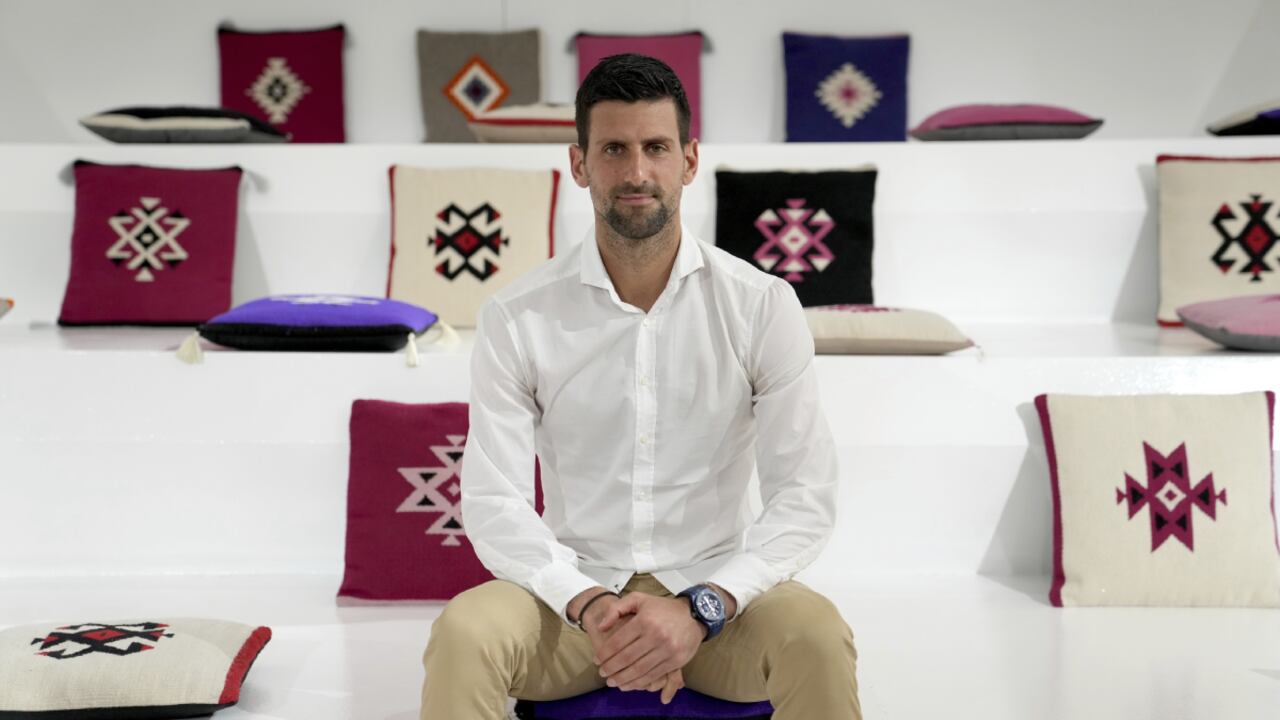 Serbian tennis star Novak Djokovic poses for a photo after his presentation of the Novak Djokovic foundation in the Serbia pavilion at Dubai Expo 2020, in Dubai, United Arab Emirates, Thursday, Feb. 17, 2022. Djokovic on Thursday received a warm welcome in Dubai, where he visited the world's fair following the global drama around his decision to remain unvaccinated. (AP/Ebrahim Noroozi)
