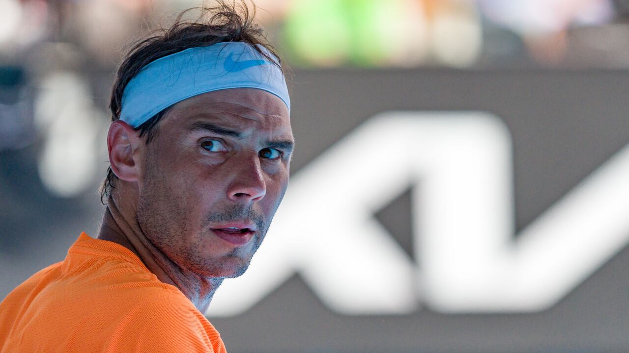 MELBOURNE, AUSTRALIA - JANUARY 16: Rafael Nadal of Spain looks on in the round one singles match against Jack Draper of Great Britain during day one of the 2023 Australian Open at Melbourne Park on January 16, 2023 in Melbourne, Australia. (Photo by Andy Cheung/Getty Images)