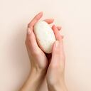Female hands holding natural organic soap. Healthy lifestyle, beauty, skin care. Zero waste, plastic free bathroom and home concept.