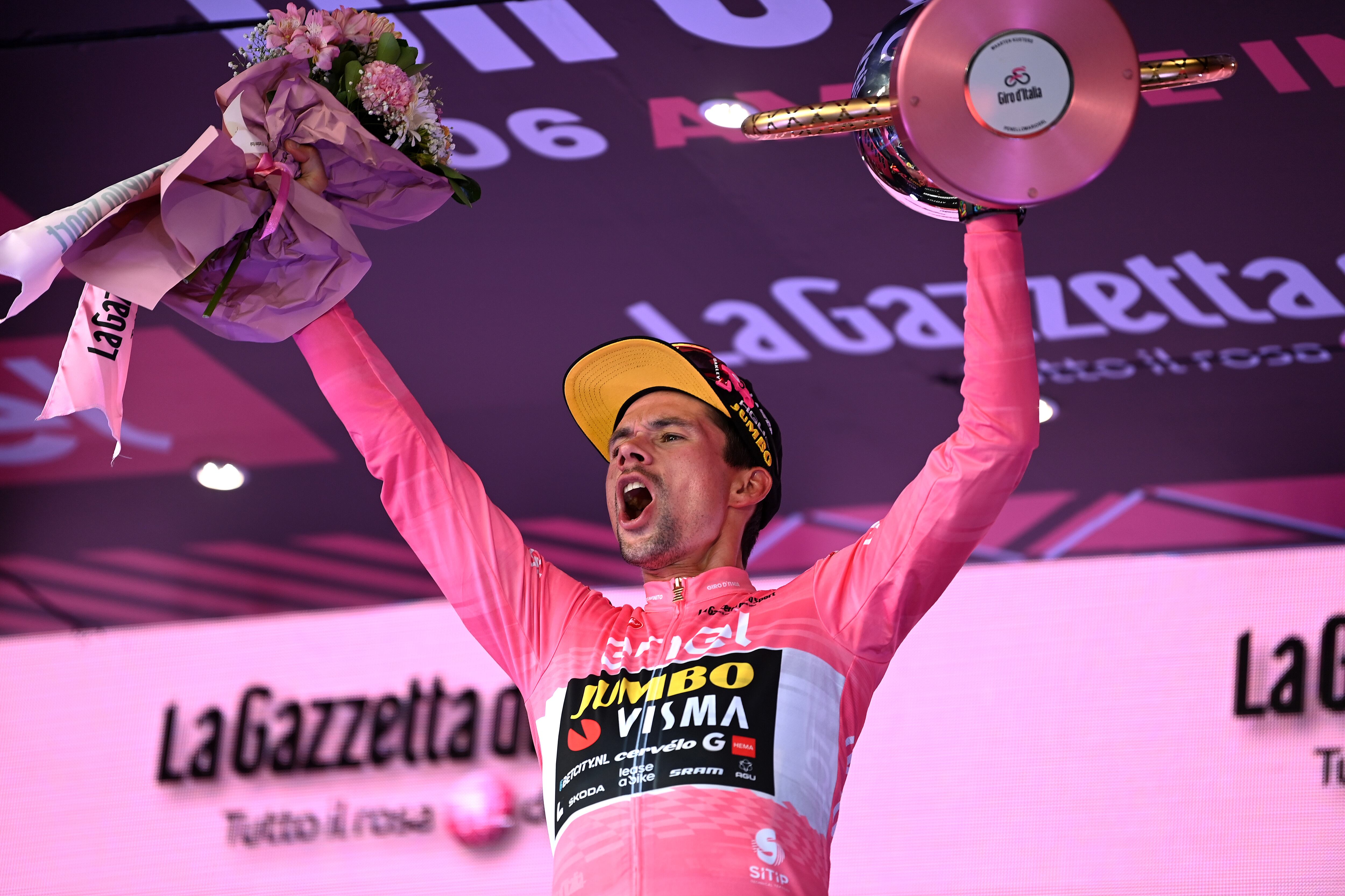 ROME, ITALY - MAY 28: Primož Roglič of Slovenia and Team Jumbo-Visma - Pink Leader Jersey celebrates at podium with the Trofeo Senza Fine as final overall race winner during the 106th Giro d'Italia 2023, Stage 21 a 126km stage from Rome to Rome / #UCIWT / on May 28, 2023 in Rome, Italy. (Photo by Tim de Waele/Getty Images)