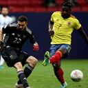 BRASILIA, BRAZIL - JULY 06: Duvan Zapata of Colombia competes for the ball with goalkeeper Emiliano Martinez of Argentina during the semifinal match between Argentina and Colombia as part of CONMEBOL Copa America Brazil 2021 at Mane Garrincha Stadium on July 6, 2021 in Brasilia, Brazil. (Photo by MB Media/Getty Images)