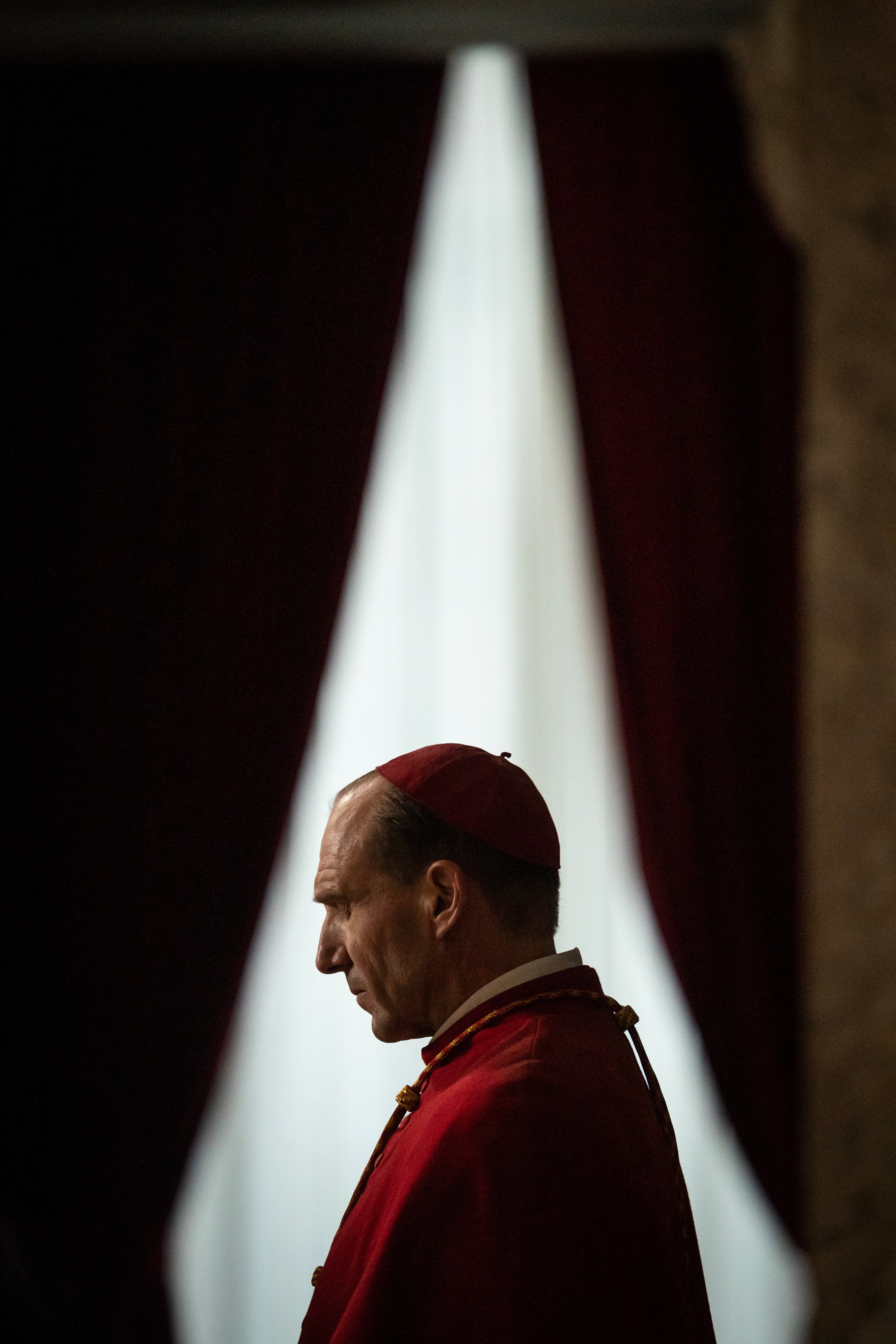 Ralph Fiennes stars as Cardinal Lawrence in director Edward Berger's CONCLAVE, a Focus Features release. Credit: Philippe Antonello/Focus Features ©2024 All Rights Reserved.