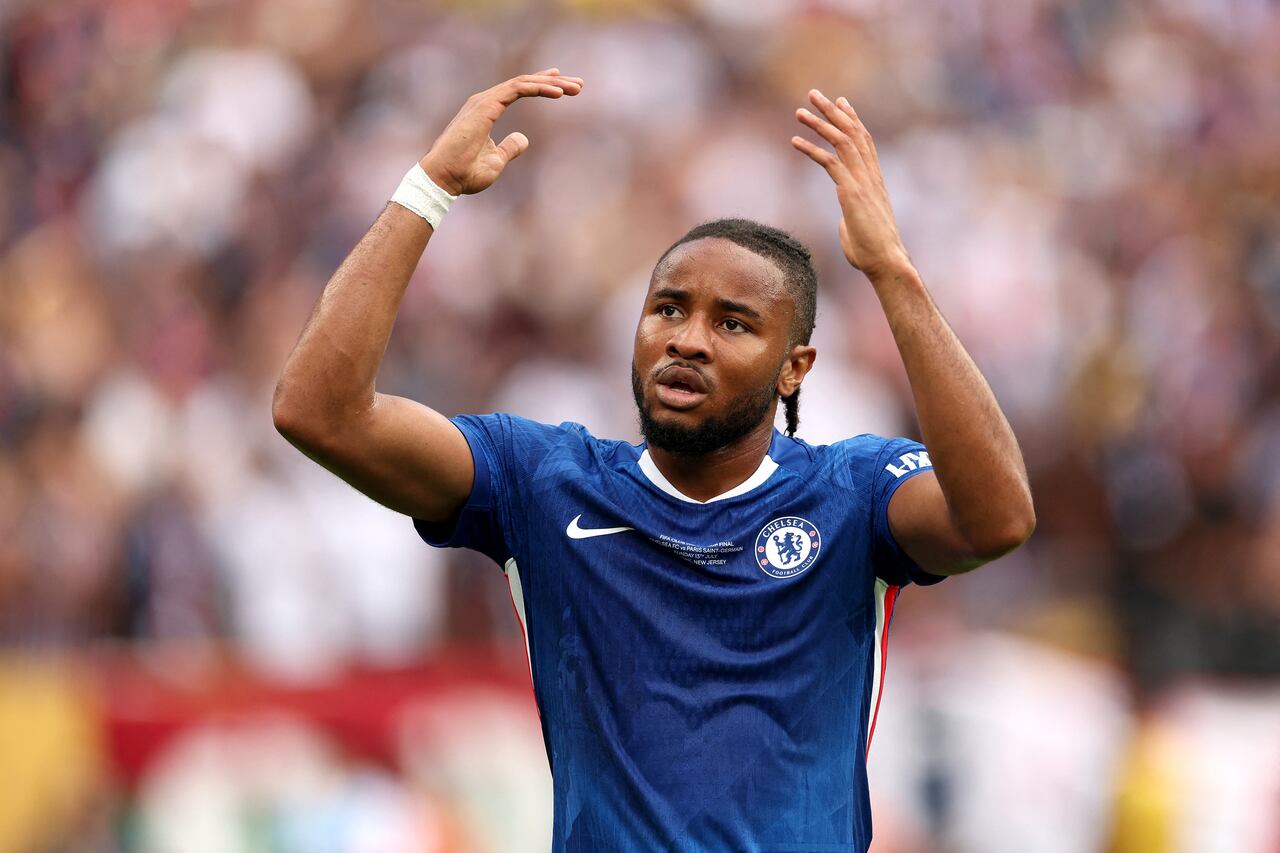 EAST RUTHERFORD, NEW JERSEY - JULY 13: Christopher Nkunku #18 of Chelsea FC celebrates following the FIFA Club World Cup 2025 Final match between Chelsea FC and Paris Saint-Germain at MetLife Stadium on July 13, 2025 in East Rutherford, New Jersey. Luke Hales/Getty Images/AFP (Photo by Luke Hales / GETTY IMAGES NORTH AMERICA / Getty Images via AFP)