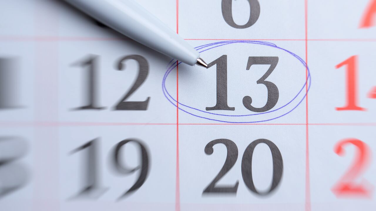 Circled number 13 on paper calendar.
