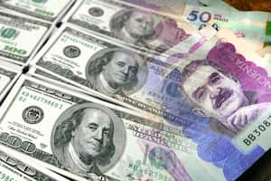 Dólar de Estados Unidos y pesos de Colombia. Imagen de referencia.