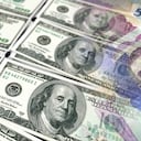 Dólar de Estados Unidos y pesos de Colombia. Imagen de referencia.