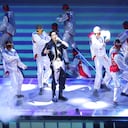 AL KHOR, QATAR - NOVEMBER 20: Jungkook of the South Korean Boy Band BTS performs during the opening ceremony prior to the FIFA World Cup Qatar 2022 Group A match between Qatar and Ecuador at Al Bayt Stadium on November 20, 2022 in Al Khor, Qatar. (Photo by Marc Atkins/Getty Images)