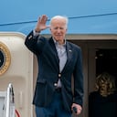 President Joe Biden waves before boarding Air Force One for a trip to Florida to visit areas impacted by Hurricane Ian, Wednesday, Oct. 5, 2022, at Andrews Air Force Base, Md. (AP Photo/Gemunu Amarasinghe)