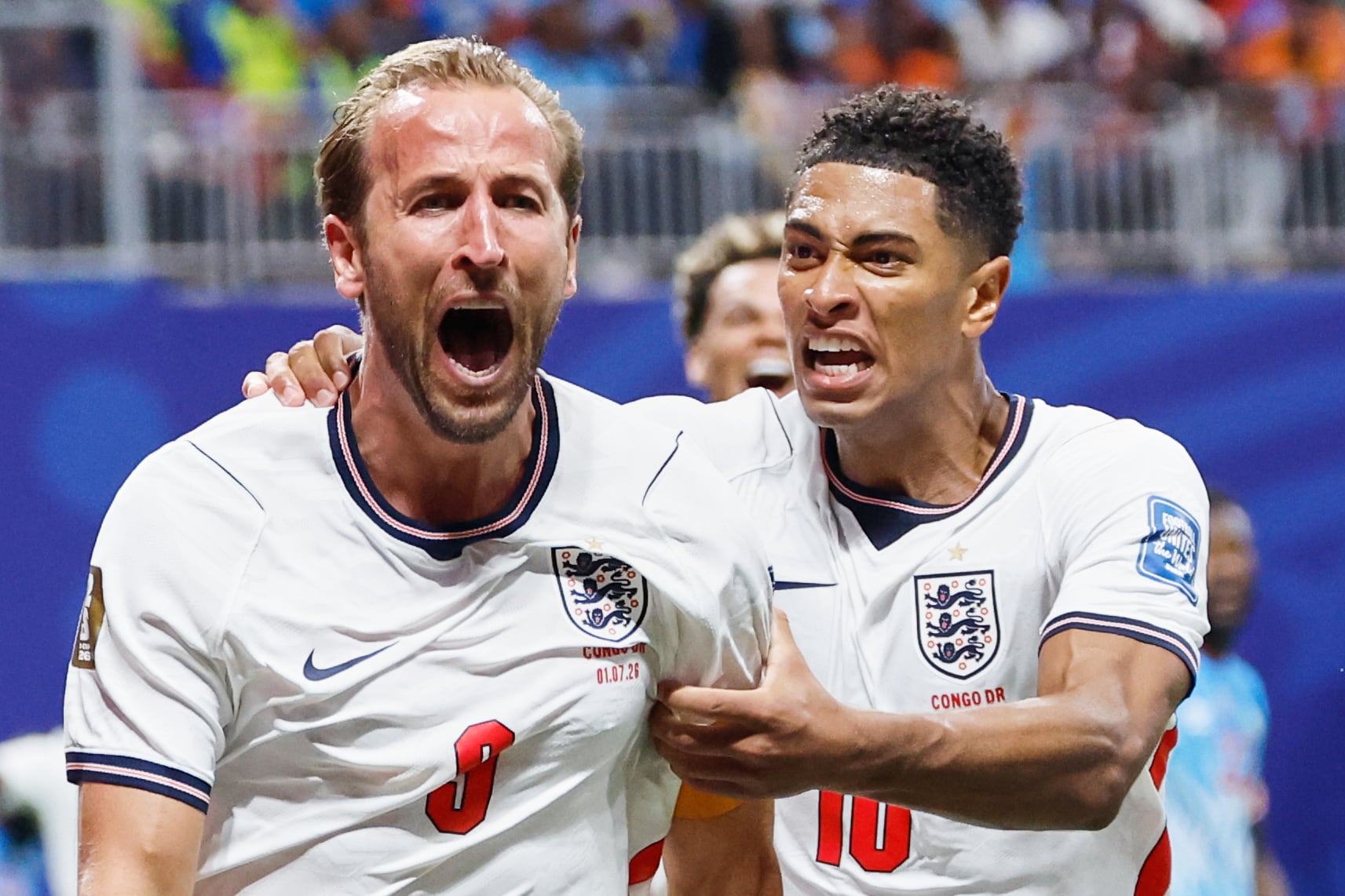 England's Harry Kane, left, celebrates with Jude Bellingham after scoring their first goal during the World Cup round of 32 soccer match between England and Congo in Atlanta, Wednesday, July 1, 2026. (AP Photo/Butch Dill)