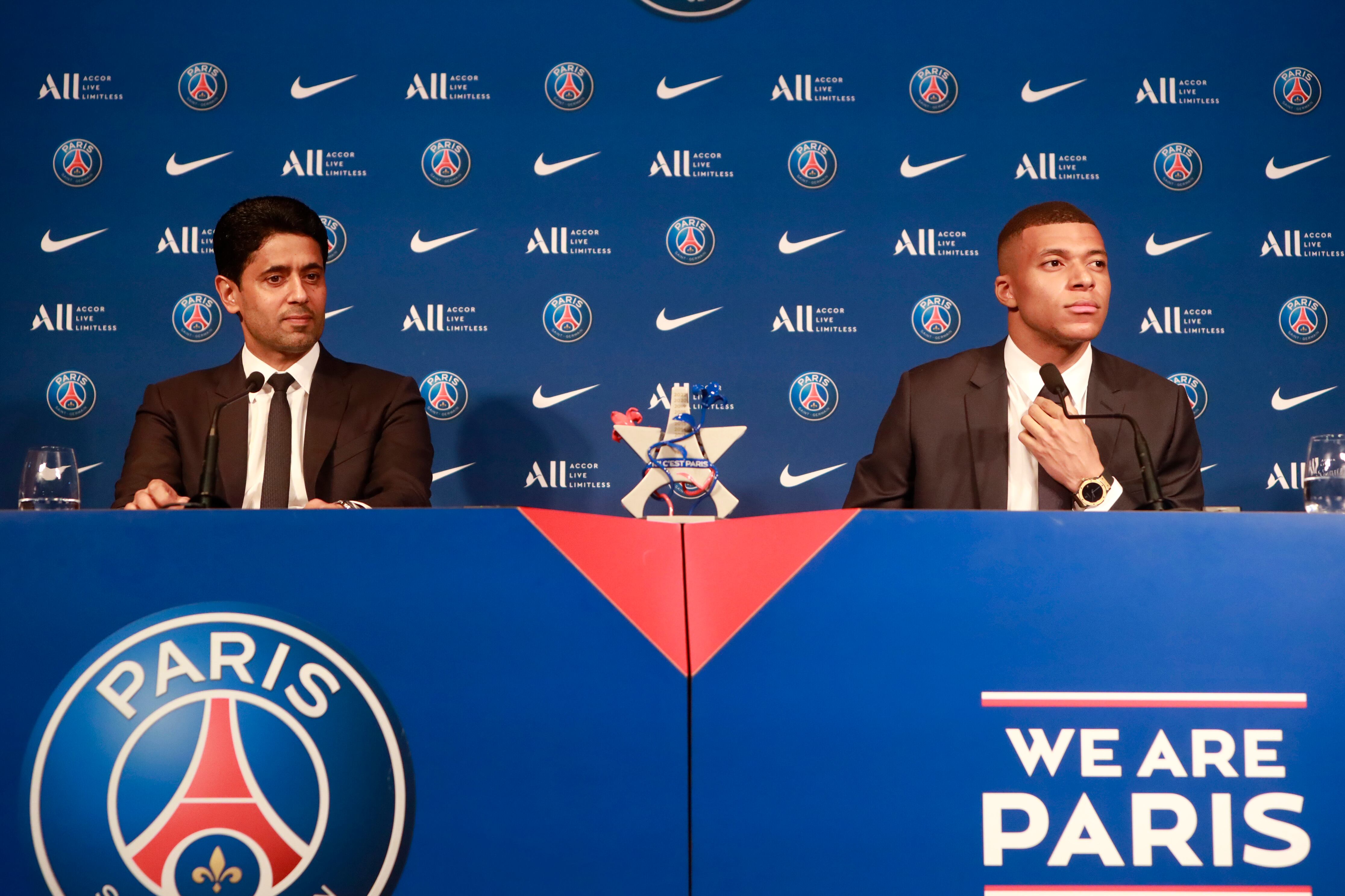 PARIS, FRANCE - MAY 23: President of Paris Saint-Germain, Nasser Al-Khelaifi and Kilian Mbappe speak to the media after Mbappe signs a new contract with PSG at Parc des Princes on May 23, 2022 in Paris, France. (Photo by Julien Hekimian - PSG/PSG via Getty Images)