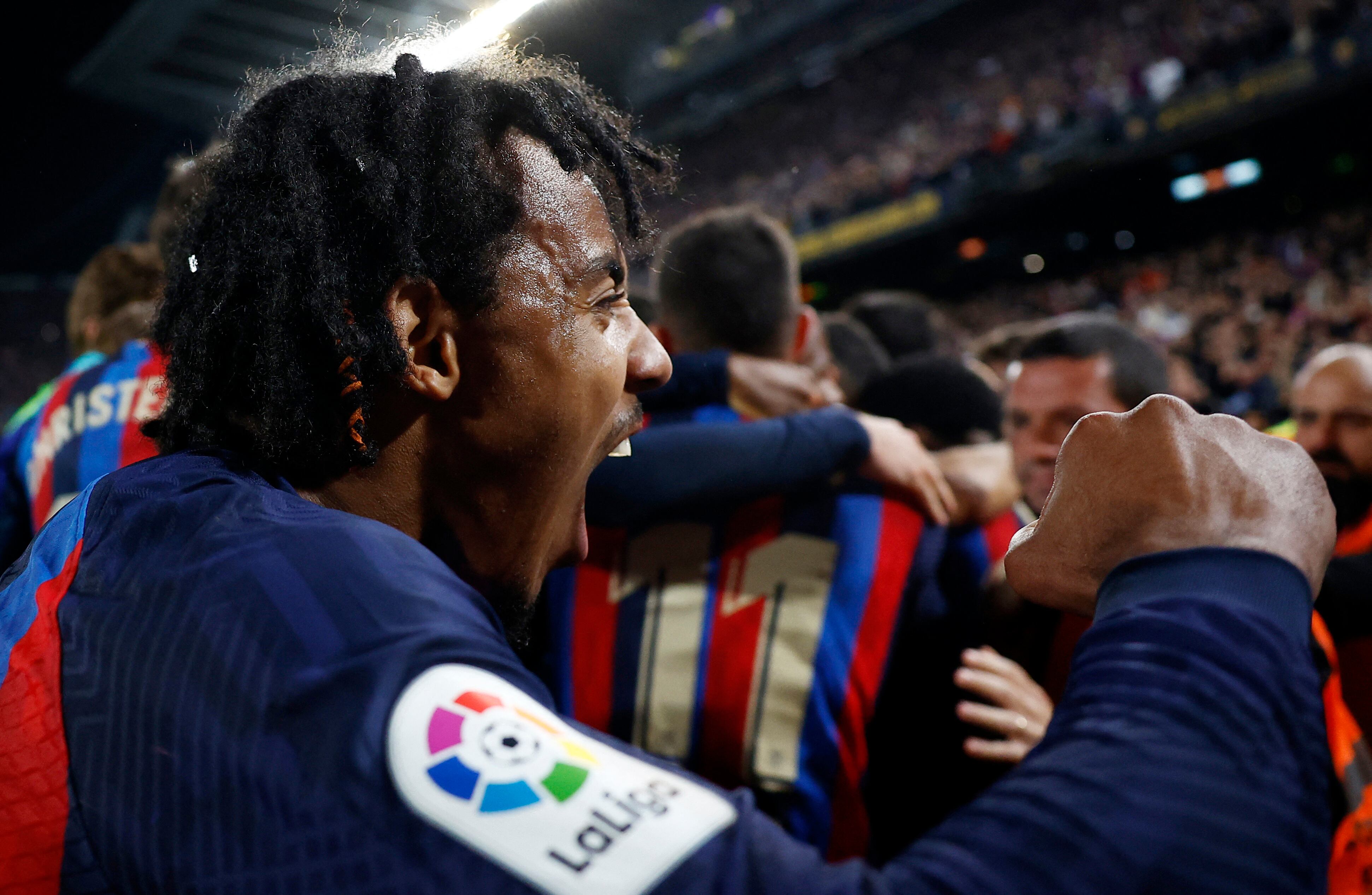 Soccer Football - LaLiga - FC Barcelona v Real Madrid - Camp Nou, Barcelona, Spain - March 19, 2023 FC Barcelona's Jules Kounde celebrates their second goal scored by Franck Kessie REUTERS/Juan Medina