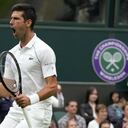 Serbia's Novak Djokovic celebrates winning a point during the men's singles match against Britain's Jack Draper on day one of the Wimbledon Tennis Championships in London, Monday June 28, 2021. (AP Photo/Kirsty Wigglesworth)