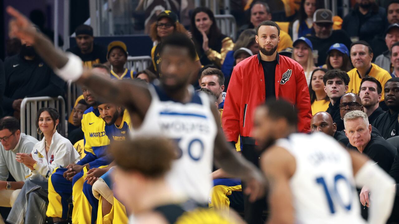 SAN FRANCISCO, CALIFORNIA - MAY 12: Stephen Curry #30 of the Golden State Warriors looks on from the bench during the first quarter against the Minnesota Timberwolves in Game Four of the Western Conference Second Round NBA Playoffs at Chase Center on May 12, 2025 in San Francisco, California. NOTE TO USER: User expressly acknowledges and agrees that, by downloading and or using this photograph, User is consenting to the terms and conditions of the Getty Images License Agreement. (Photo by Ezra Shaw/Getty Images)