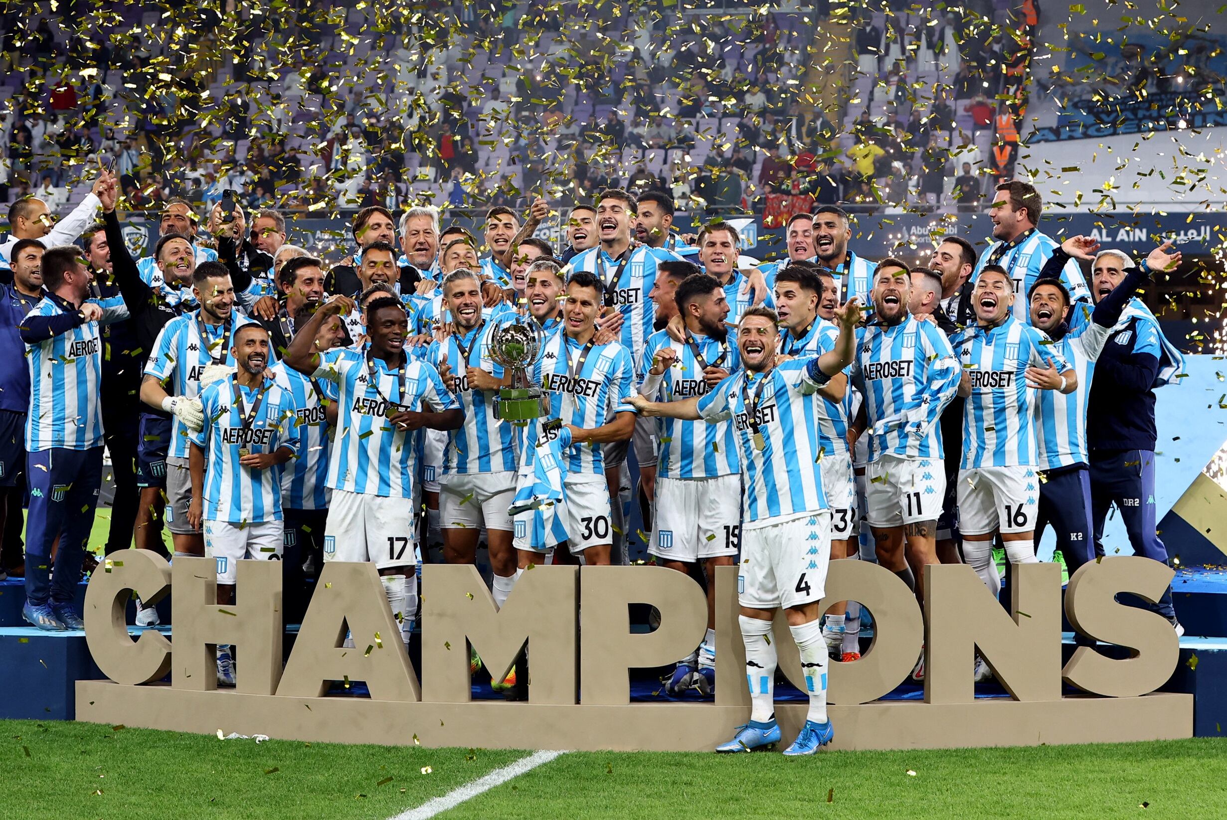 Soccer Football - Argentine Super Cup - Boca Juniors v Racing Club - Hazza bin Zayed Stadium, Al Ain, United Arab Emirates - January 20, 2023 Racing Club celebrate winning the Argentine Super Cup with the trophy REUTERS/Rula Rouhana