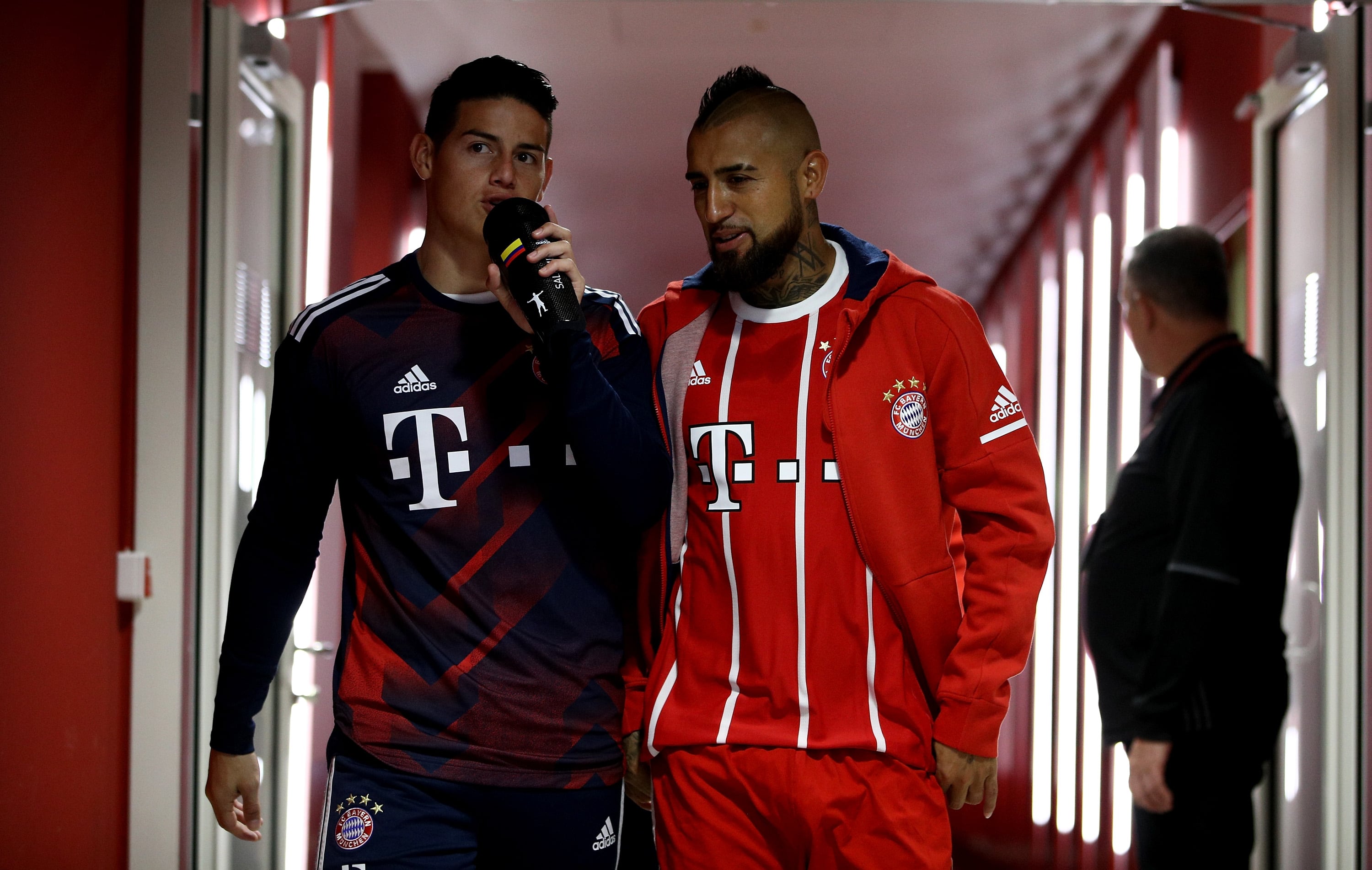 MUNICH, GERMANY - SEPTEMBER 22: Arturo Vidal (R) of FC Bayern Muenchen and team mate James arrive at the players' tunnel before the Bundesliga match between FC Bayern Muenchen and VfL Wolfsburg at Allianz Arena on September 22, 2017 in Munich, Germany. (Photo by A. Pretty/FC Bayern via Getty Images )