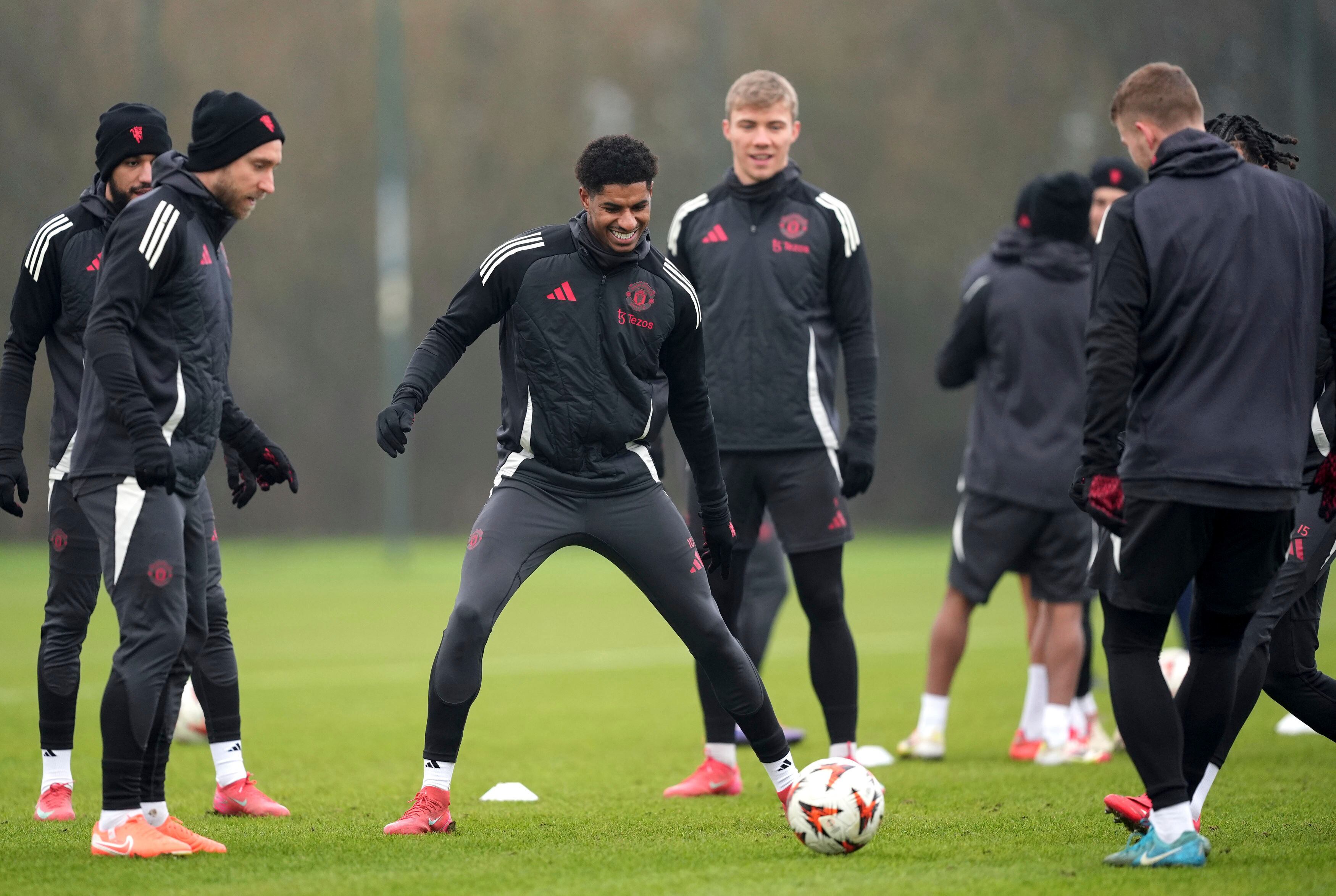 Manchester United's Marcus Rashford, center, during a training session in Manchester,  England, Wednesday, Jan. 22, 2025, ahead of the Europa League soccer match between Manchester United and Rangers FC. (Martin Rickett/PA via AP)